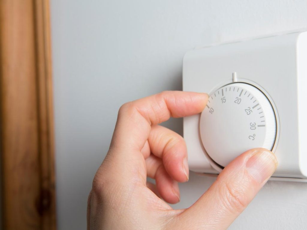 Adjusting The Thermostat To A Comfortable Temperature