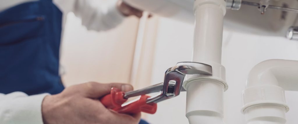 Plumber Installing New Pipes